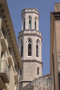 Low angle view of historic building against clear sky