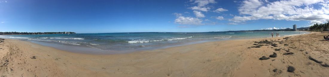 Panoramic view of beach against sky