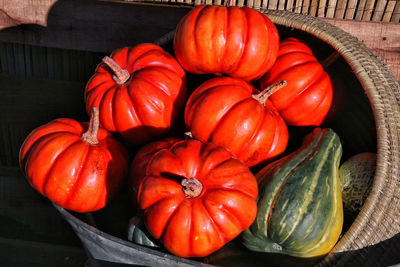 High angle view of pumpkins in wicker basket