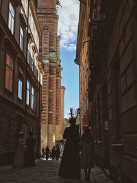 People walking on street in city