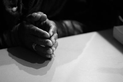 Close-up of mother holding baby hand