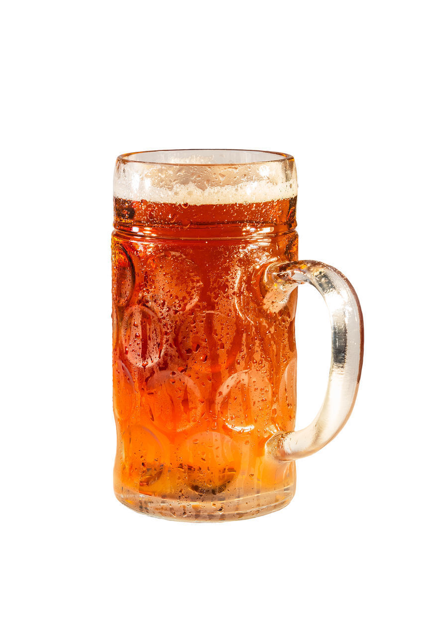 CLOSE-UP OF BEER GLASS ON WHITE BACKGROUND