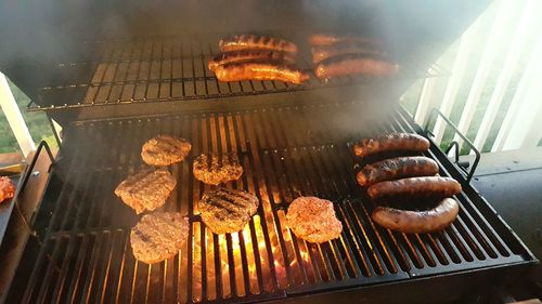 Close-up of meat on barbecue grill