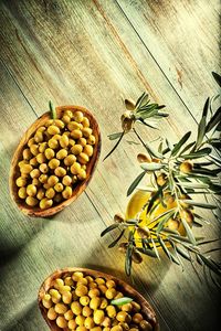 High angle view of green olives on the table