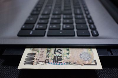 Close-up of laptop on table