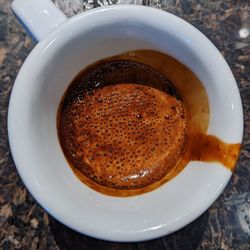 Directly above shot of coffee cup on table