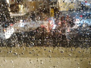 Full frame shot of wet glass window