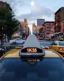 City street against cloudy sky