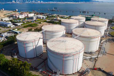 High angle view of buildings by sea