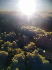 Aerial view of sunlight streaming through clouds