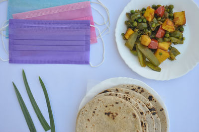 High angle view of breakfast served on table