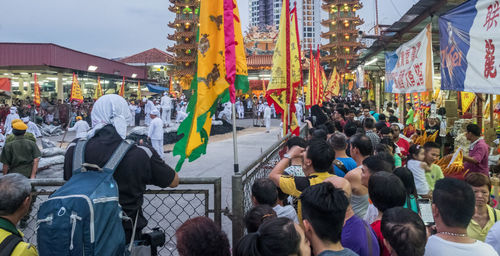 Crowd standing in town square