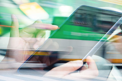 Close-up of hand on train