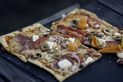 Close-up of pizza on cutting board