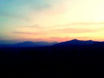 Silhouette of mountains at sunset