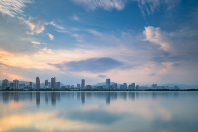 Scenic view of lake against sky during sunset