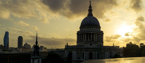 View of historic building against sky during sunset