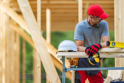 Side view of man working at farm