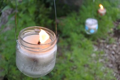 High angle view of illuminated tea light