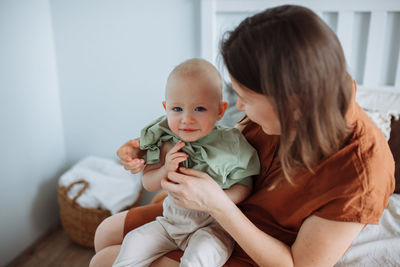 Portrait of cute baby girl at home