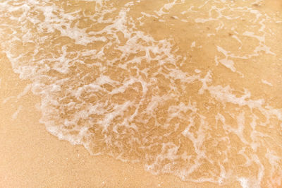 Close-up of sand on beach