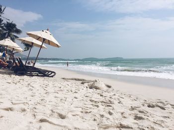 Scenic view of beach against sky