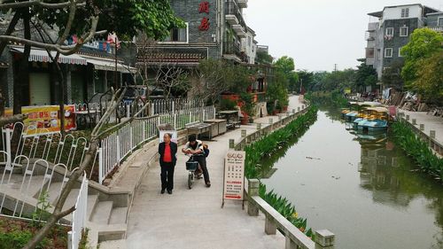 People walking in canal