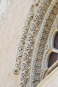Low angle view of ornate carving on building