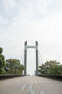 View of bridge against cloudy sky