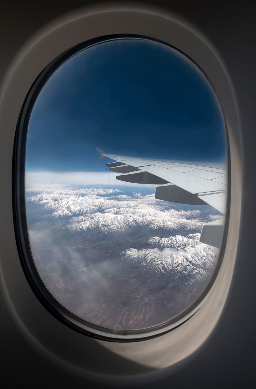 AERIAL VIEW OF SEASCAPE AGAINST SKY