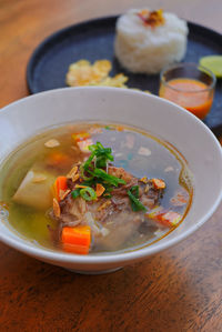 Close-up of soup in bowl on table