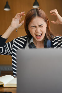 Frustrated woman at office