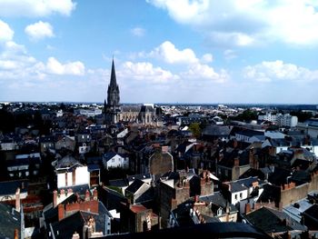 High angle view of townscape against cloudy sky