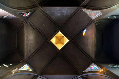 Low angle view of illuminated ceiling of building