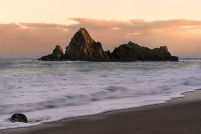 Scenic view of sea against sky during sunset