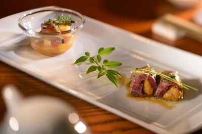 Close-up of served food in plate