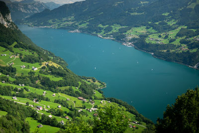 High angle view of townscape by sea