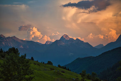 Scenic view of mountains against sky during sunset