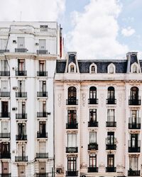 View of residential buildings against sky