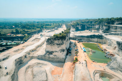 High angle view of river amidst buildings in city