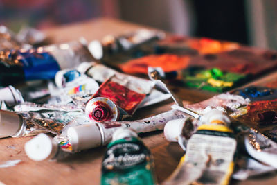 Close-up of paintbrushes on table