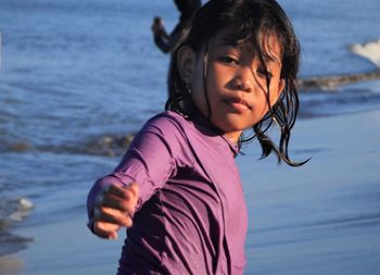 Portrait of smiling girl on beach