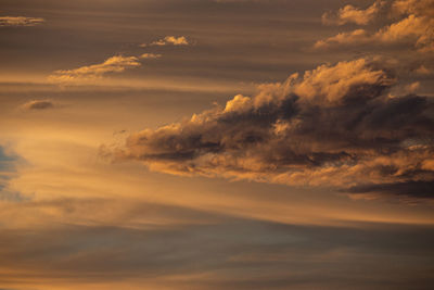 Low angle view of dramatic sky during sunset
