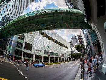 Buildings in city against sky