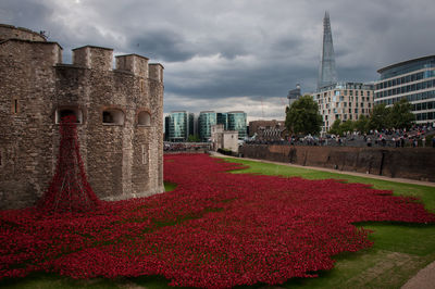 View of buildings against cloudy sky