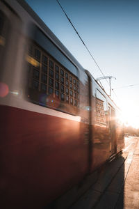 Train at railroad station against clear sky