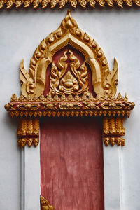 Close-up of ornate door of building