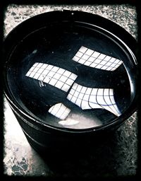 Close-up of circular object on wall