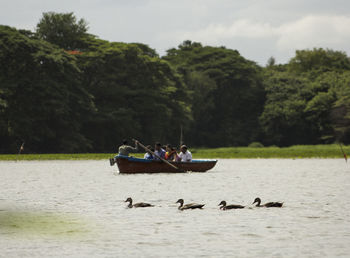 Boats in calm lake