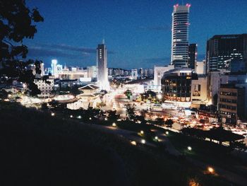 Illuminated cityscape at night